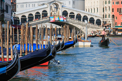 Gondolas moored on canal