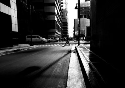 Man on road in city