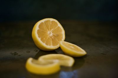 Close-up of lemon slice on table