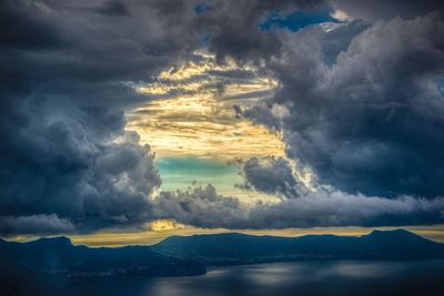 Scenic view of dramatic sky over sea