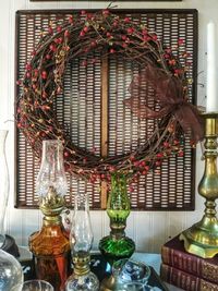 Close-up of illuminated lamp hanging on table at home