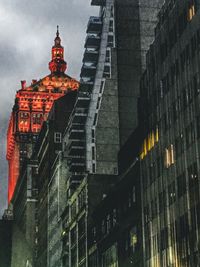 Low angle view of illuminated building at night