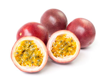 Close-up of fruits against white background