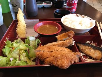 Close-up of food served on table