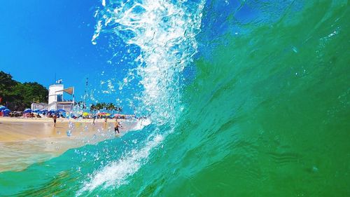 People on swimming pool at beach