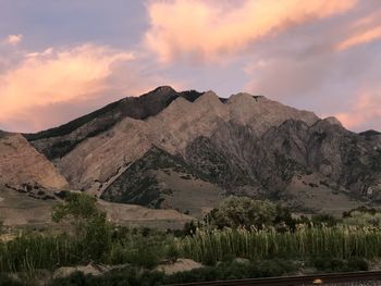 Scenic view of mountains against sky during sunset