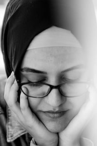 Close-up of thoughtful young woman