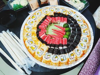 Close-up of sushi served on table