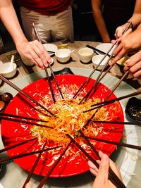 High angle view of people preparing food