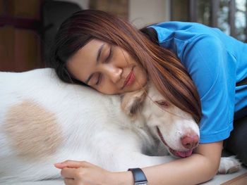 Close-up of woman with dog