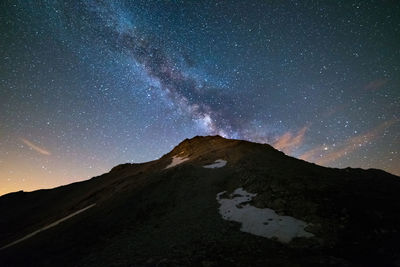 Mountain against clear sky at night