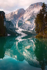 Aerial view of lake and mountains against sky