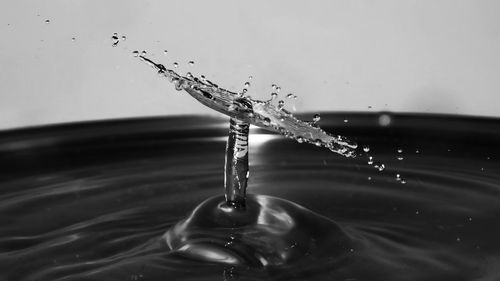 Close-up of drop splashing in water