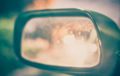 Reflection of camera on side-view mirror