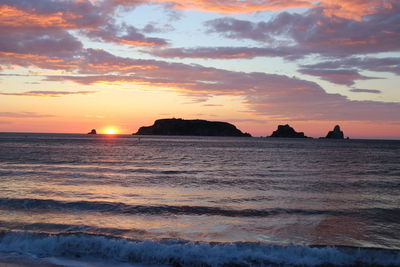 Scenic view of sea against sky during sunset