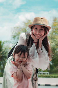 Portrait of a happy girl with hat