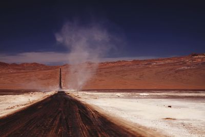 Scenic view of land against sky