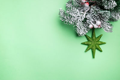 Directly above shot of christmas decorations on blue background