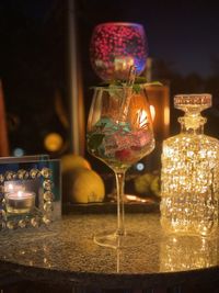 Close-up of wineglasses on table