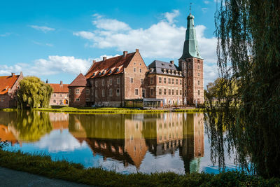 Reflection of buildings in lake