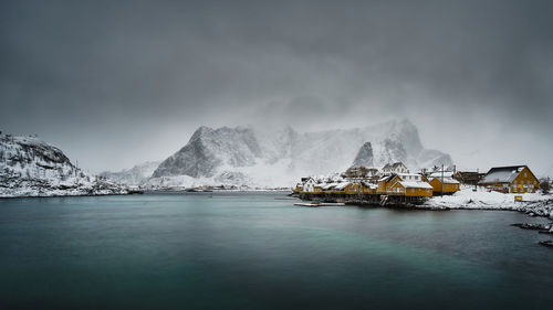 Scenic view of sea against sky during winter