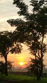 Scenic view of landscape against sky during sunset