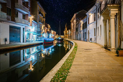 Long exposure photo of comacchio at night under a starry sky