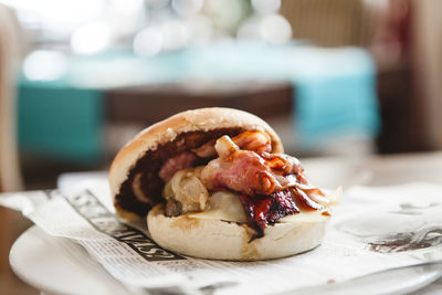 Close-up of burger in plate on table