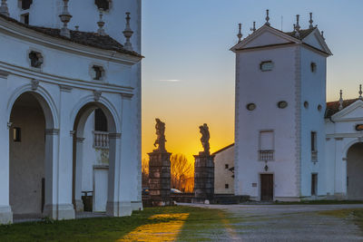 Sunset between the columns. ancient residence of the doge of venice. udine. italy