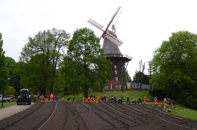 View of traditional windmill against sky