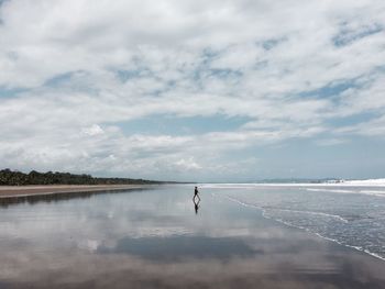 Scenic view of calm sea against sky