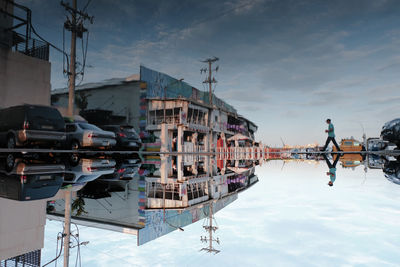 Panoramic shot of reflection in water against sky