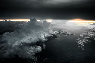 Scenic view of sea against cloudy sky