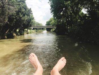 Low section of person in river