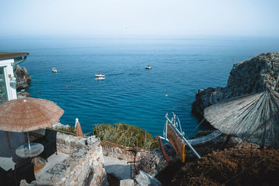 High angle view of sea shore against sky