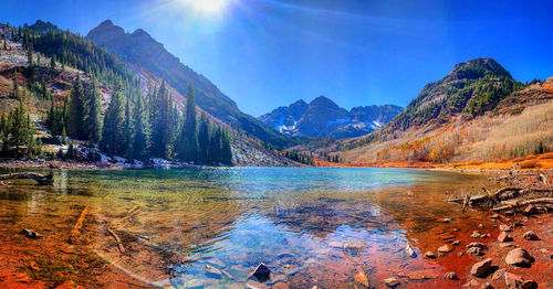 Sunkissed view of white river by maroon bells 