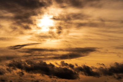 Low angle view of clouds in sky during sunset