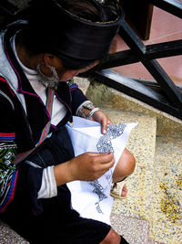 High angle view of woman wearing hat