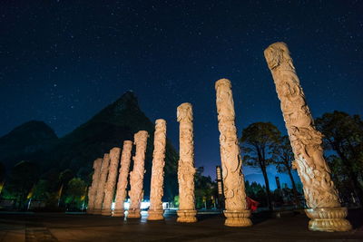 Low angle view of historical building against sky at night