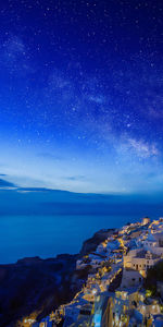 Scenic view of sea against sky at night