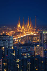 Illuminated buildings in city at night