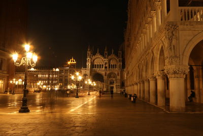Illuminated buildings in city at night
