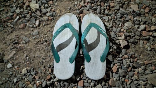 High angle view of shoes on ground