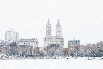 Buildings in city during winter