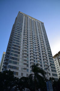 Low angle view of modern building against sky