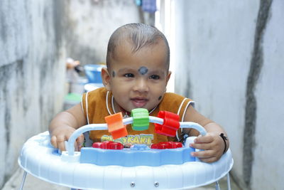 Portrait of cute boy blowing bubbles