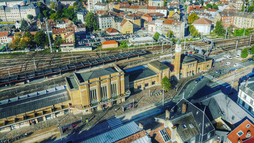 High angle view of railroad tracks amidst buildings in city