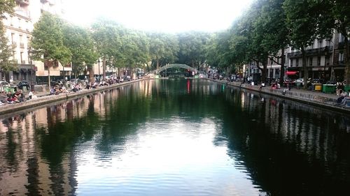 View of bridge over river in city