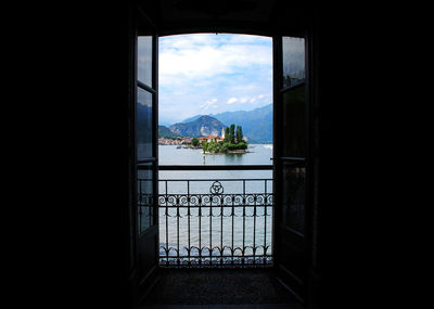 Scenic view of mountains seen through window