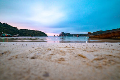 
surface level of beach against sky